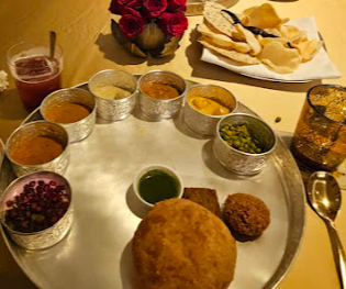 Royal Vega signature dishes Puri Bhaji in Thali
Chironji Chuara Kheer
Hari Mirch Puulikā